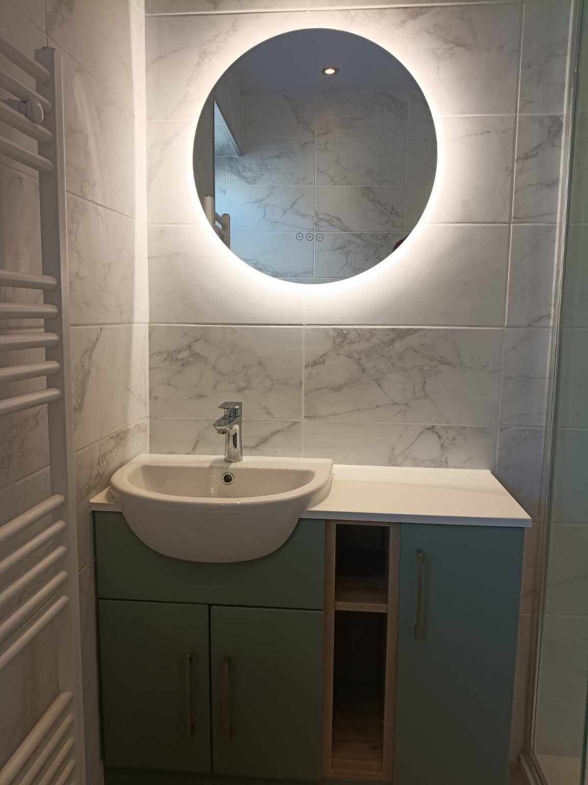 Bathroom vanity with illuminated mirror